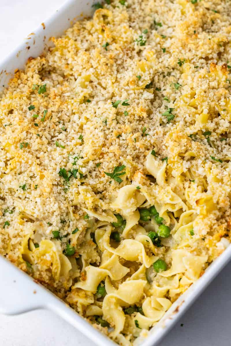 Overhead view of a tuna casserole in a white baking dish.