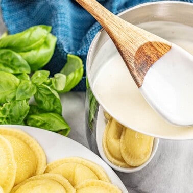 a saucepan filled with béchamel sauce.