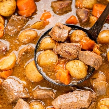 Overhead view looking into a soup pot filled with Irish stew.