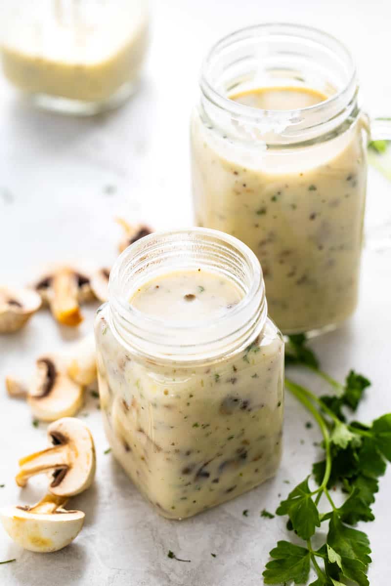 Two jars of homemade cream of mushroom soup.