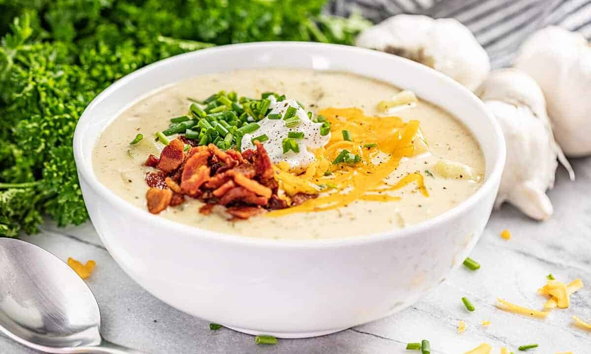 A bowl of creamy potato soup.