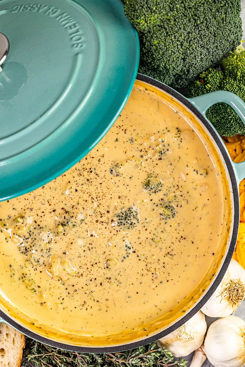 Overhead view of broccoli cheddar soup in a stockpot.