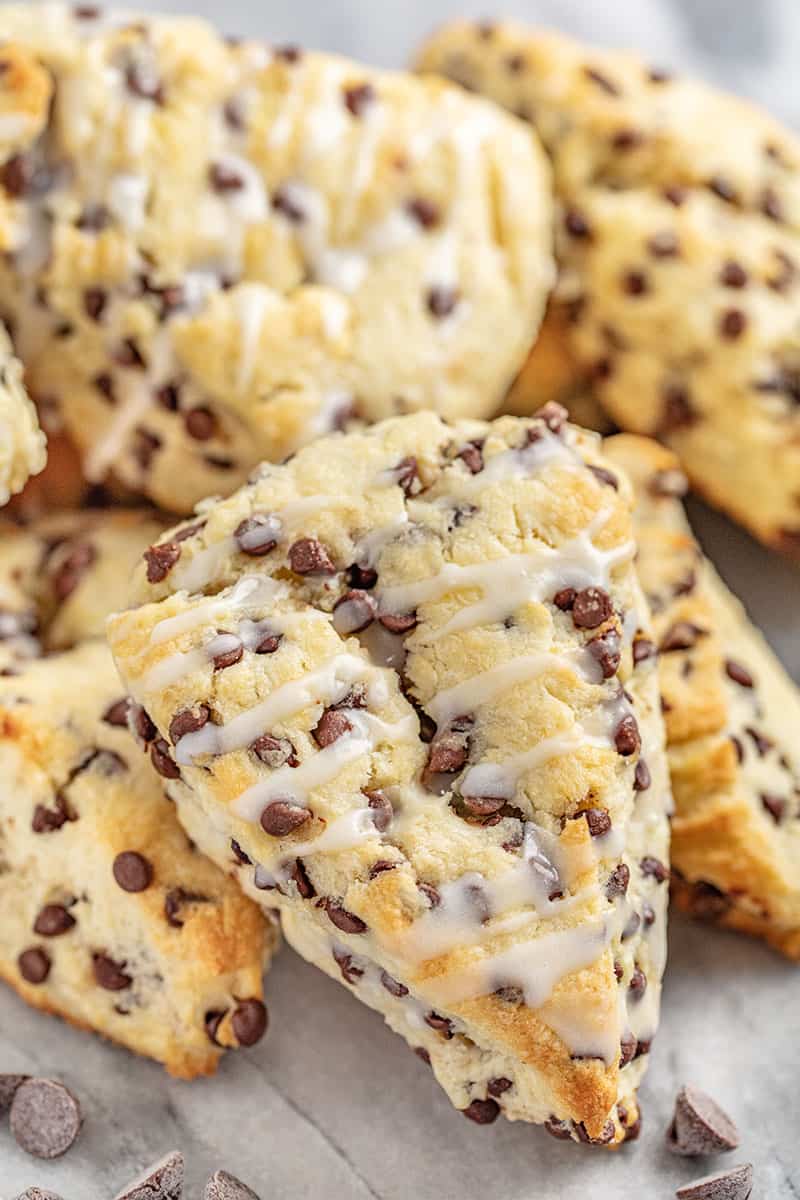 Piles of chocolate chip scones. 